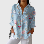 Philomena | Light Blue Blouse with Flowers and Birds